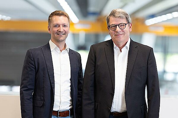 Jean-Paul Seuren (TDM Systems) and Holger Langhans (Comara)